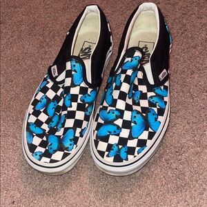 Vans Black and White Checkerboard Slip-Ons with Blue Butterflies